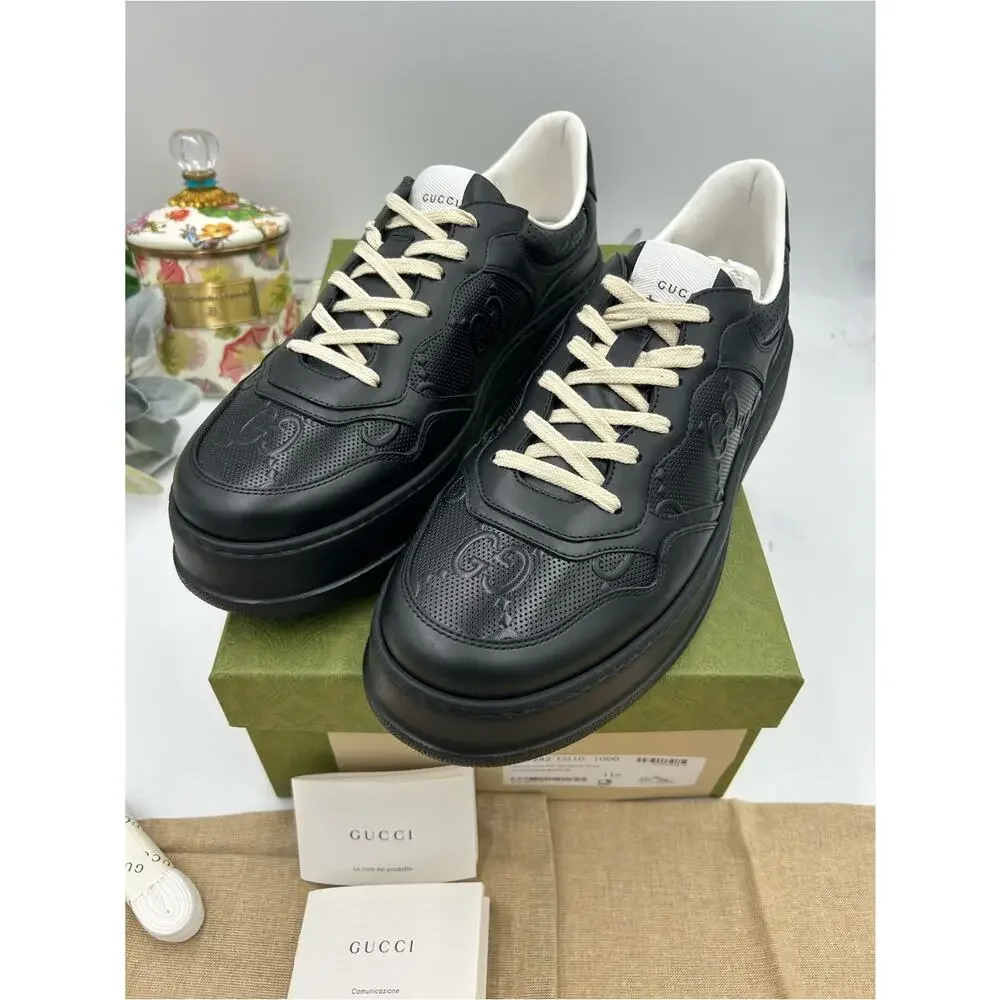 Men's Gucci, GG embossed leather sneakers size 11.5 fits 12 US made in Italy